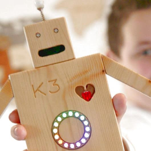 Wooden robot with a heart