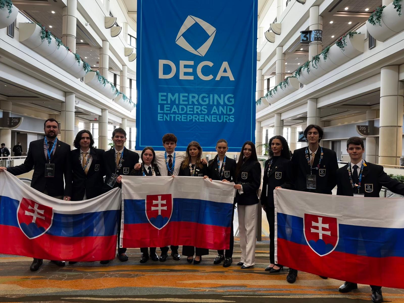 Slovak DECA team with flags at the ICDC conference